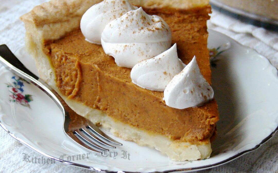 Slice of homemade pumpkin pie